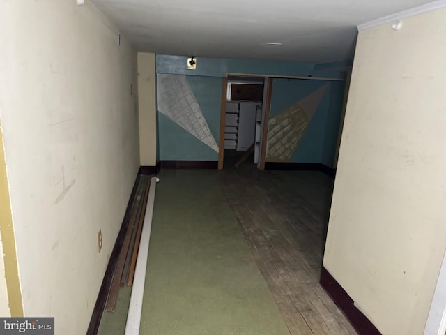 hallway featuring wood-type flooring