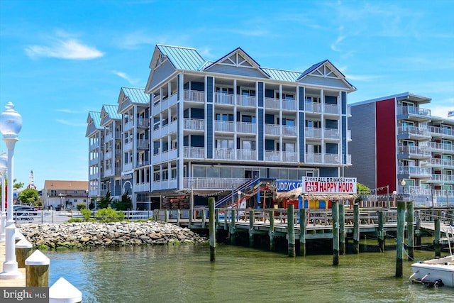 view of property with a water view