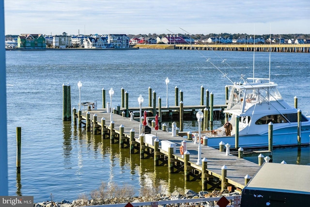 dock area featuring a water view