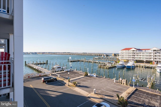 property view of water with a dock