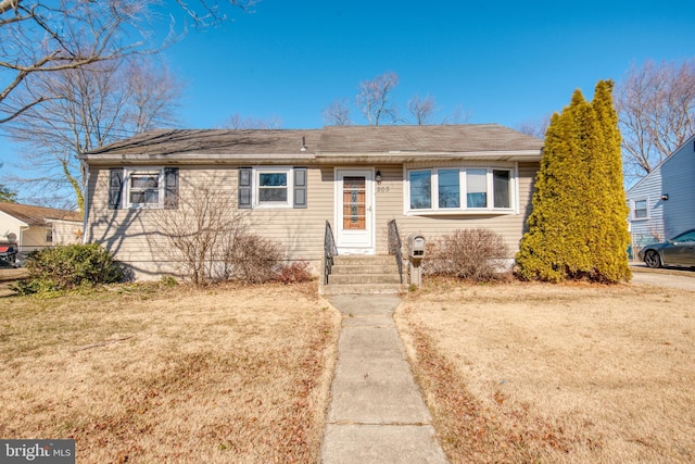 view of front of house with a front yard