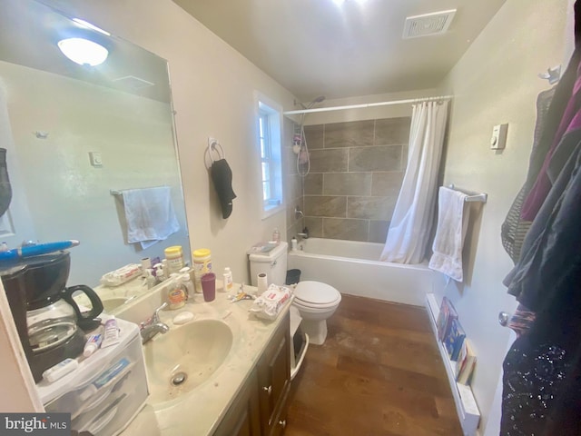 full bathroom with shower / bath combination with curtain, vanity, toilet, and hardwood / wood-style flooring