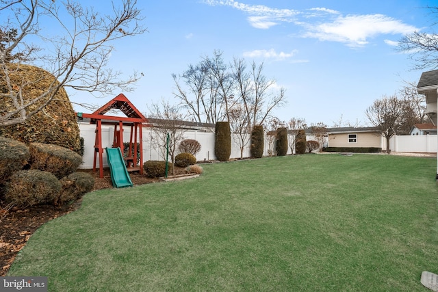 view of yard featuring a playground