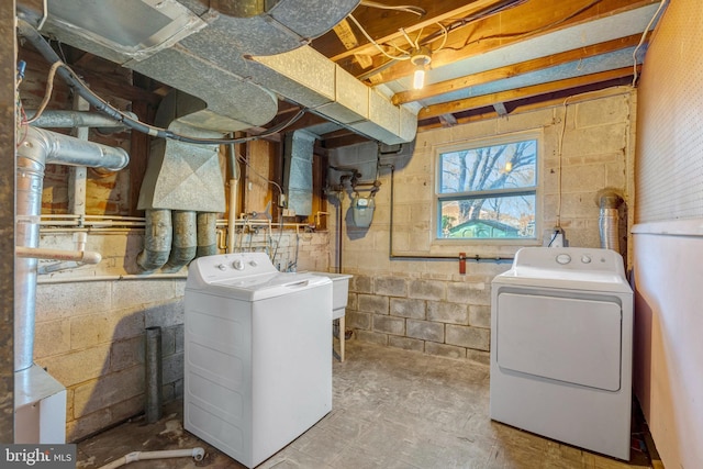 washroom featuring independent washer and dryer