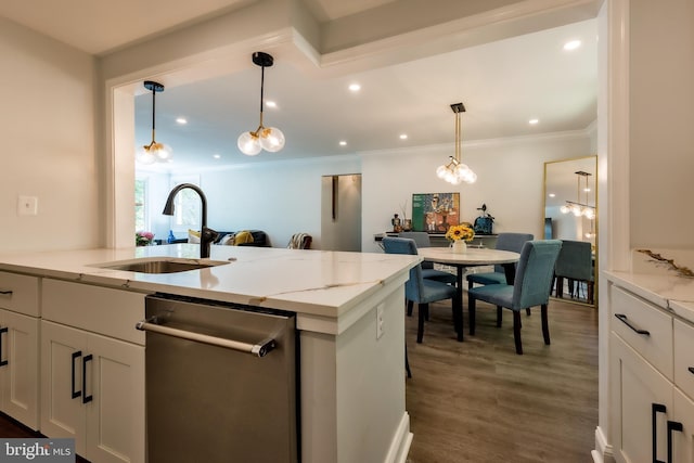 kitchen with pendant lighting, sink, white cabinets, stainless steel dishwasher, and light stone counters