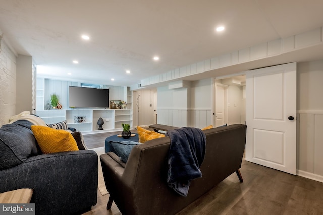 living room featuring dark hardwood / wood-style floors