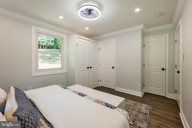 bedroom featuring dark wood-type flooring and ornamental molding