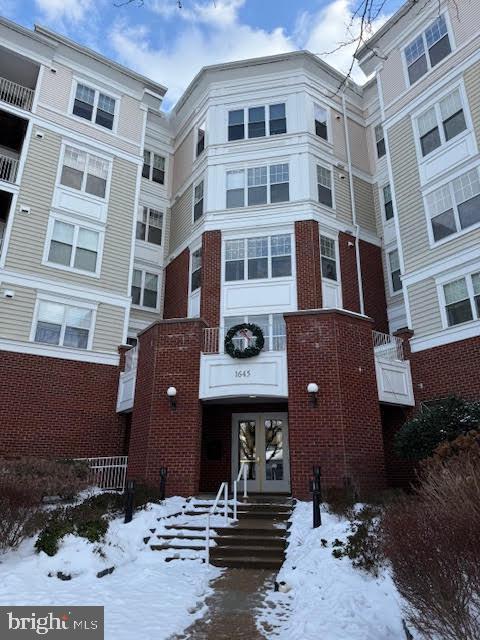 view of snow covered property