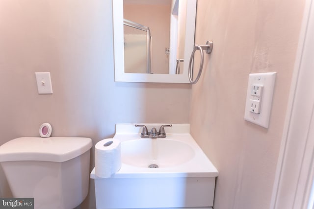 bathroom with sink and toilet