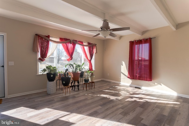 entrance foyer with dark hardwood / wood-style floors, ceiling fan, and beam ceiling