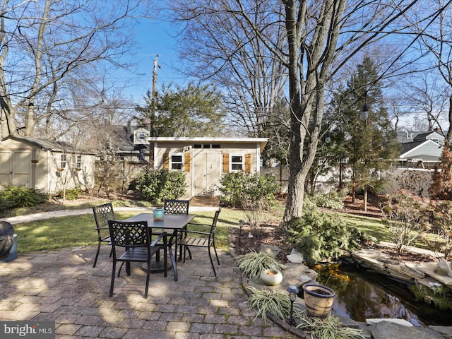 view of patio featuring a storage shed