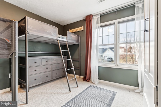 bedroom featuring a textured ceiling