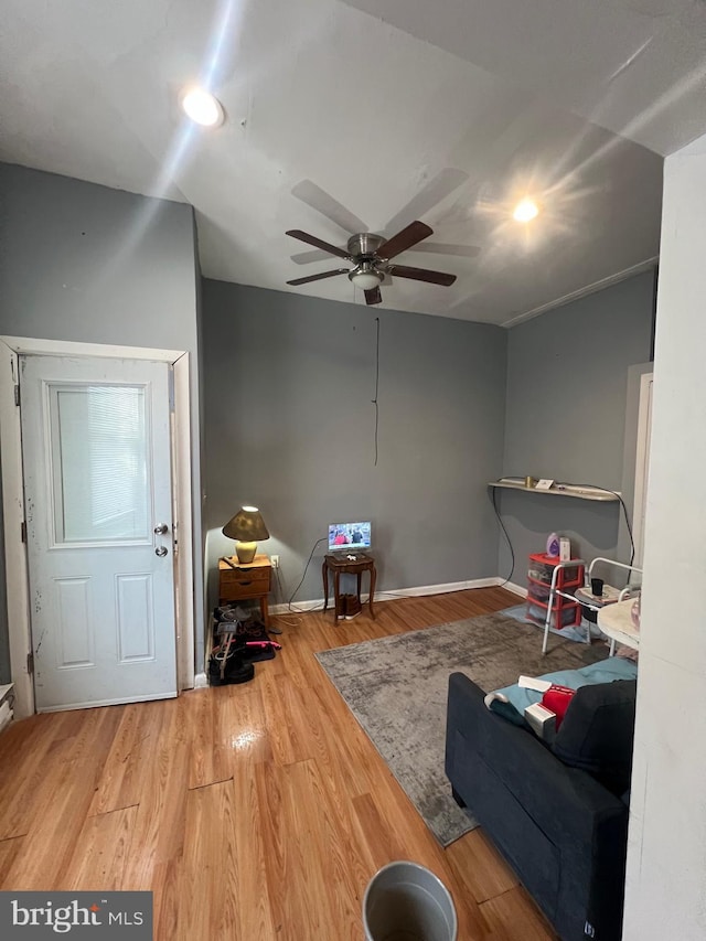 interior space featuring ceiling fan and hardwood / wood-style floors