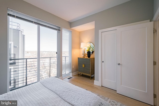 bedroom featuring light wood-type flooring