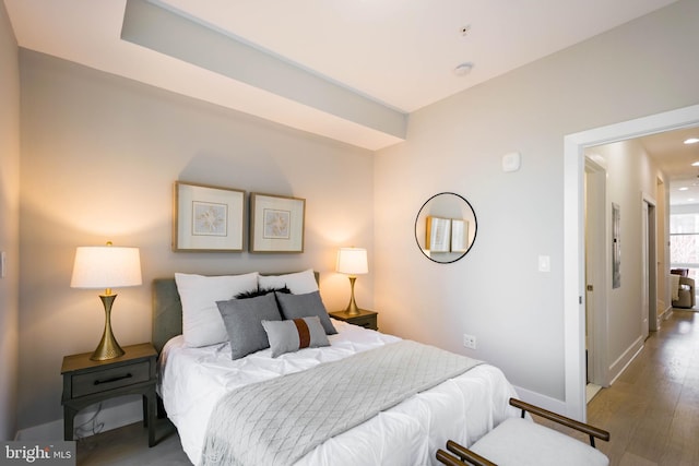 bedroom featuring wood-type flooring