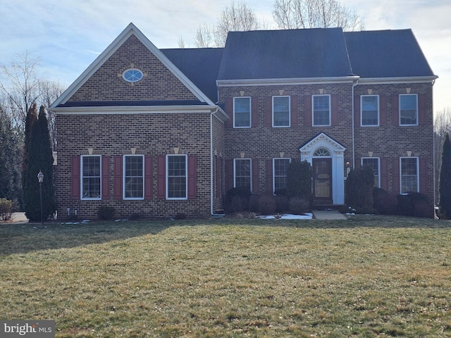 view of front of house with a front lawn