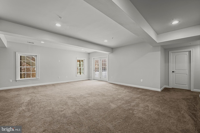 spare room with french doors and carpet floors