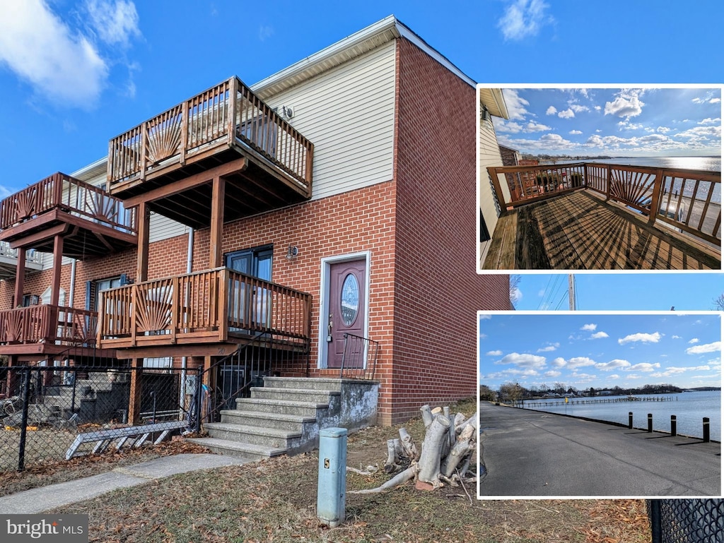 view of side of home with a water view