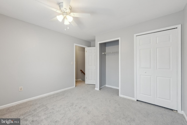 unfurnished bedroom featuring light carpet, ceiling fan, and baseboards