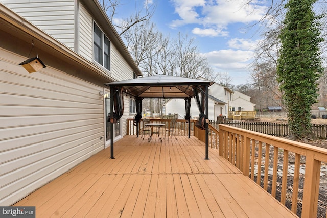 wooden deck with a gazebo