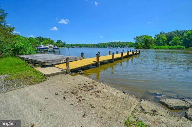 view of dock with a water view