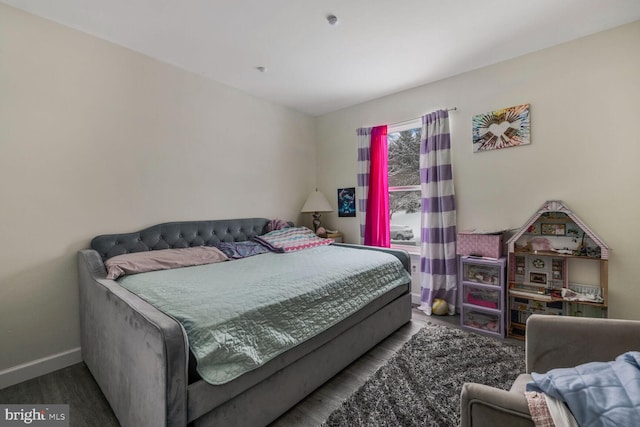 bedroom featuring hardwood / wood-style floors