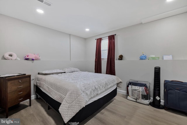 bedroom featuring light wood-type flooring