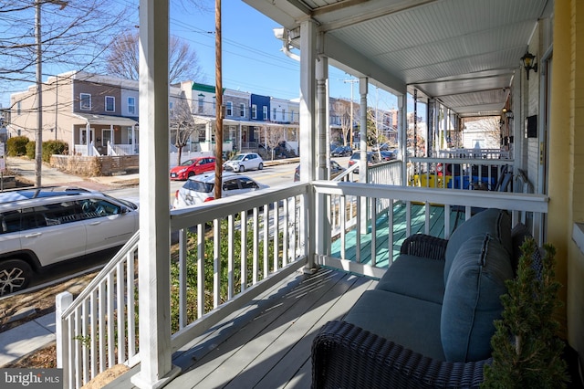 wooden deck featuring a porch