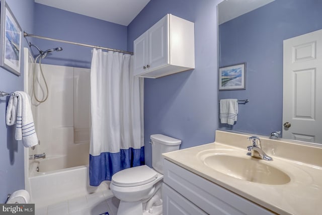 full bathroom with vanity, shower / bath combination with curtain, tile patterned floors, and toilet