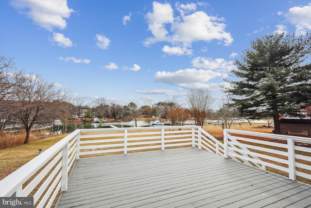 wooden terrace with a water view