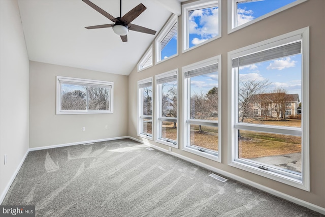 unfurnished room featuring ceiling fan, high vaulted ceiling, and carpet floors