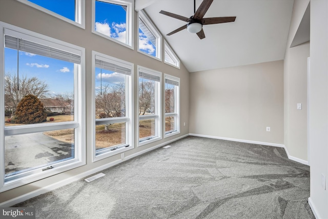 interior space with ceiling fan, plenty of natural light, and high vaulted ceiling