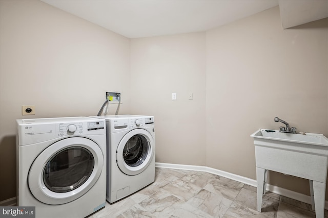 laundry room with sink and washing machine and dryer