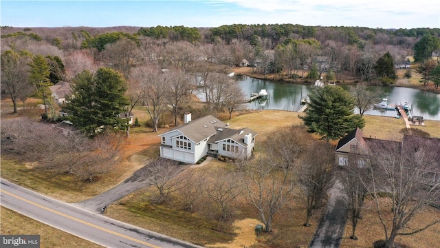 birds eye view of property featuring a water view