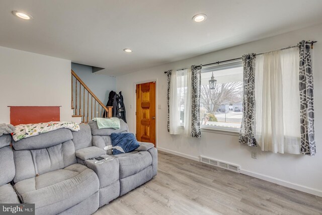 living room with hardwood / wood-style floors