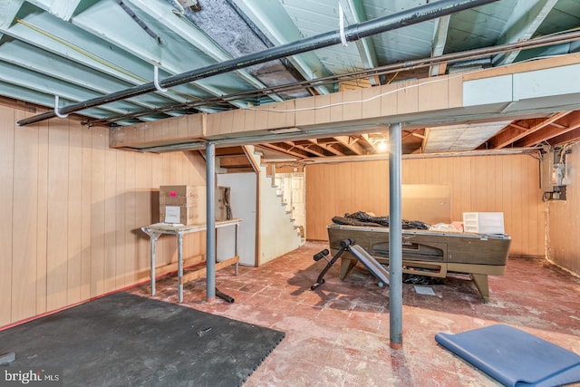 interior space featuring wood walls