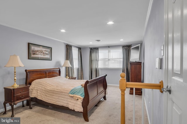 bedroom with light carpet and crown molding