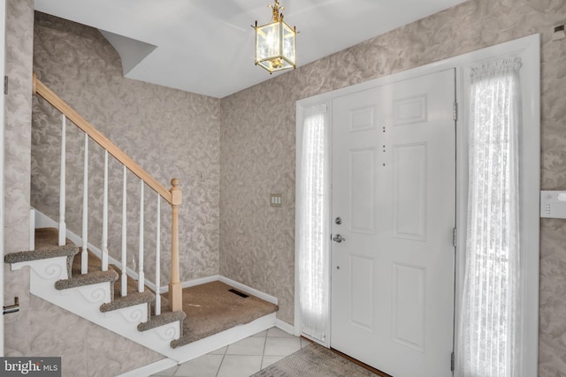 view of tiled foyer entrance