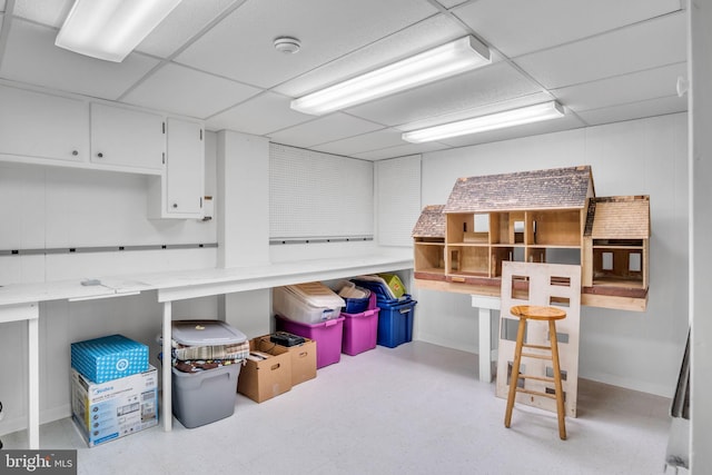 basement with a drop ceiling