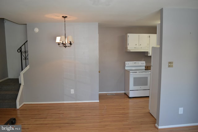 kitchen with light hardwood / wood-style flooring, white cabinetry, white electric range oven, decorative light fixtures, and a chandelier