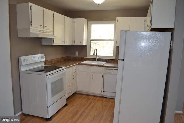 kitchen featuring sink, white cabinets, white appliances, and light wood-type flooring