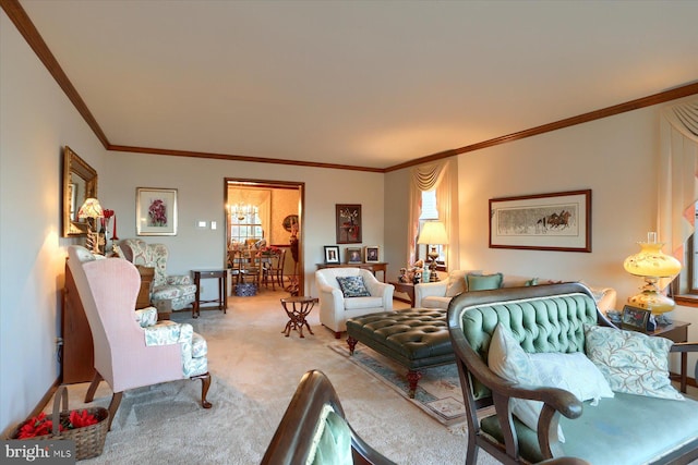 carpeted living room with a notable chandelier and ornamental molding