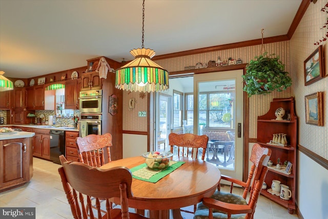 dining room featuring ornamental molding