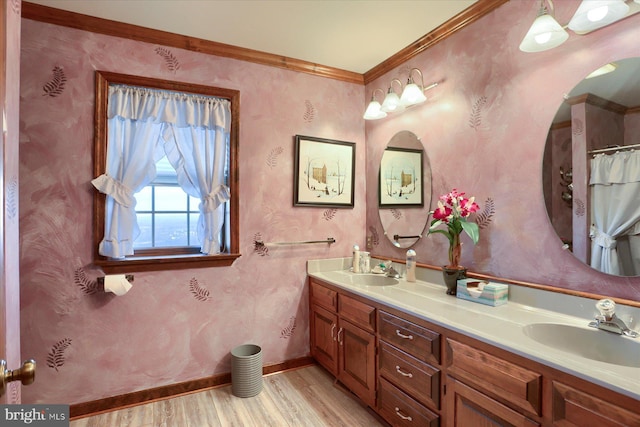 bathroom with vanity, hardwood / wood-style floors, and ornamental molding