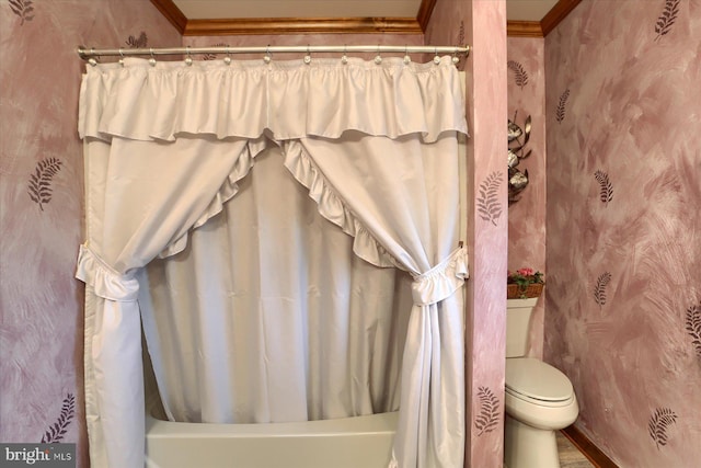 bathroom with crown molding, toilet, and shower / bath combination with curtain