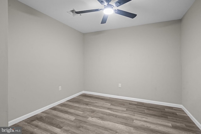 unfurnished room featuring ceiling fan and wood-type flooring