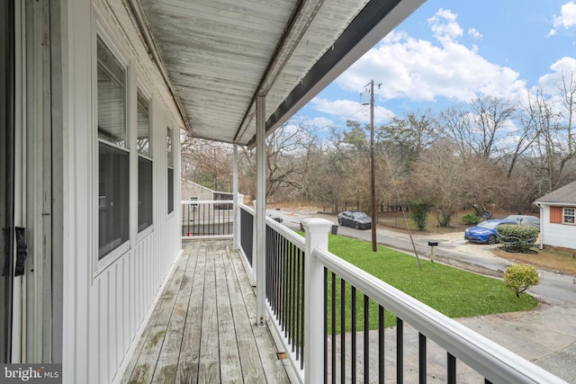 wooden terrace featuring a porch
