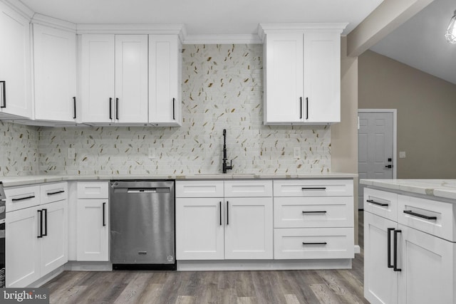 kitchen featuring sink, hardwood / wood-style flooring, dishwasher, white cabinetry, and light stone counters