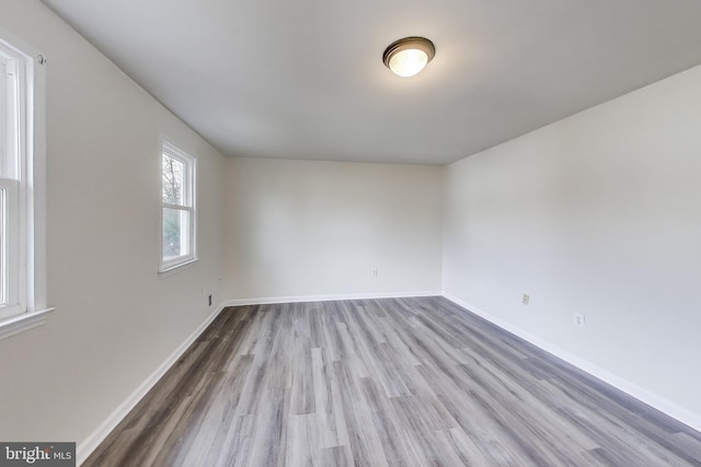 unfurnished room featuring light hardwood / wood-style flooring