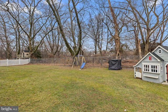 view of yard with a playground